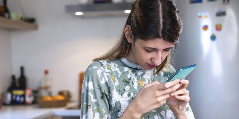 Woman looking at mobile phone